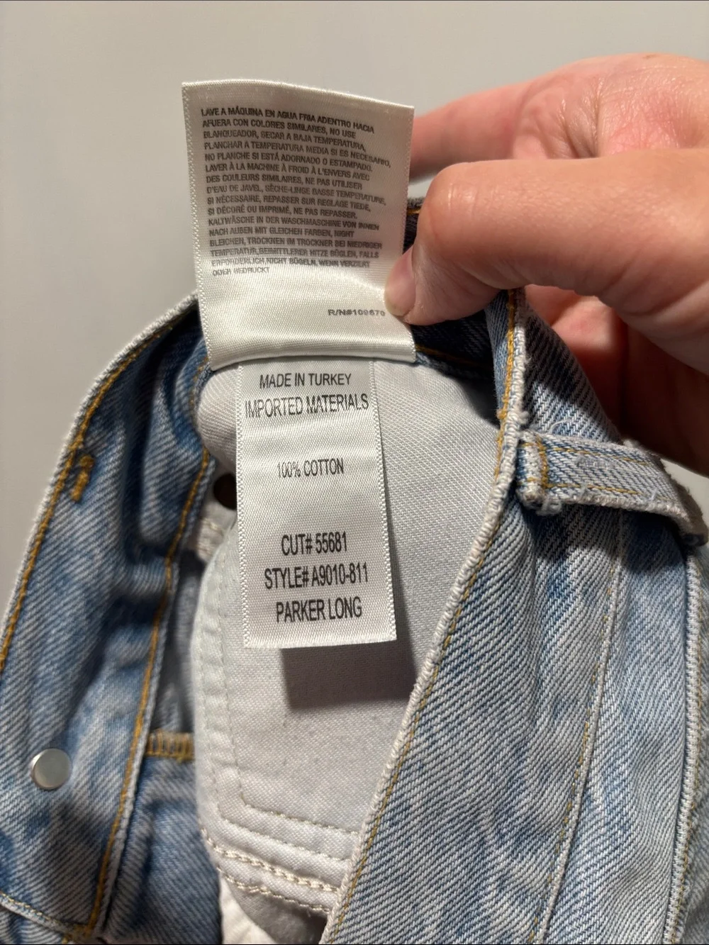 AGOLDE Parker distressed long denim shorts